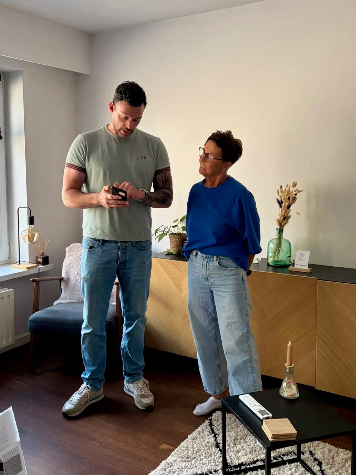 Our technician explaining the air conditioning controls to the customer after the installation