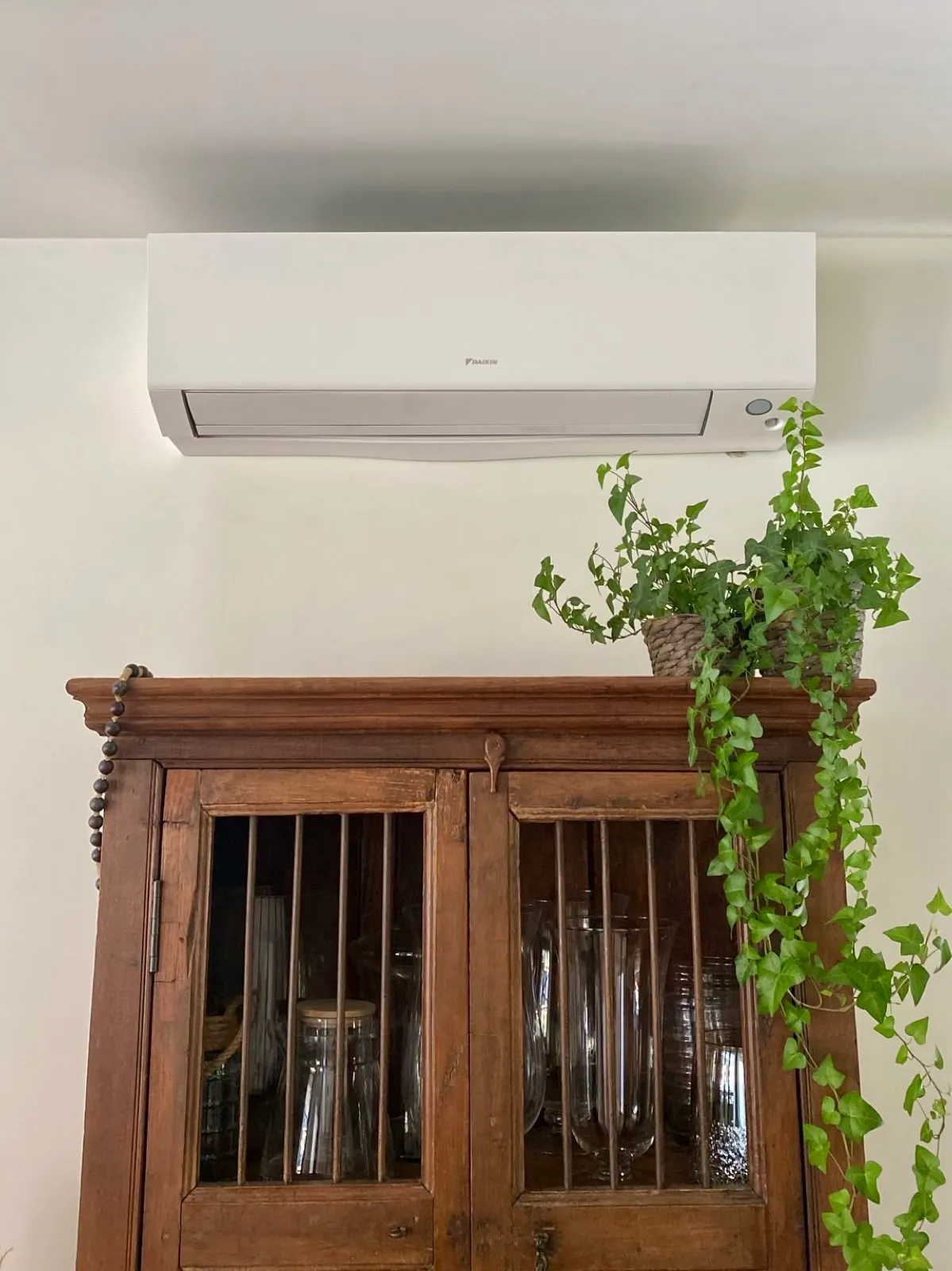 Wall-mounted air conditioning unit installed in a living room